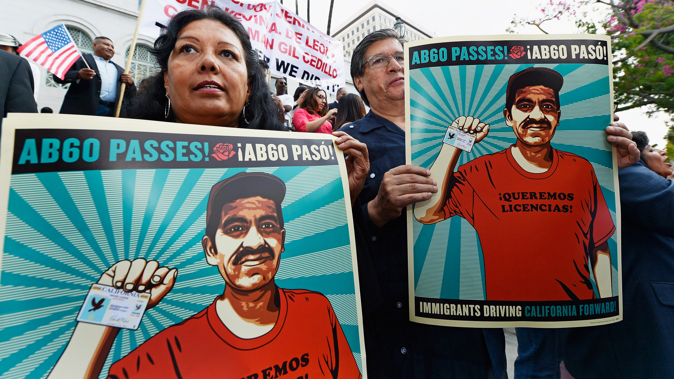 People celebrating the passage of AB60 in 2013